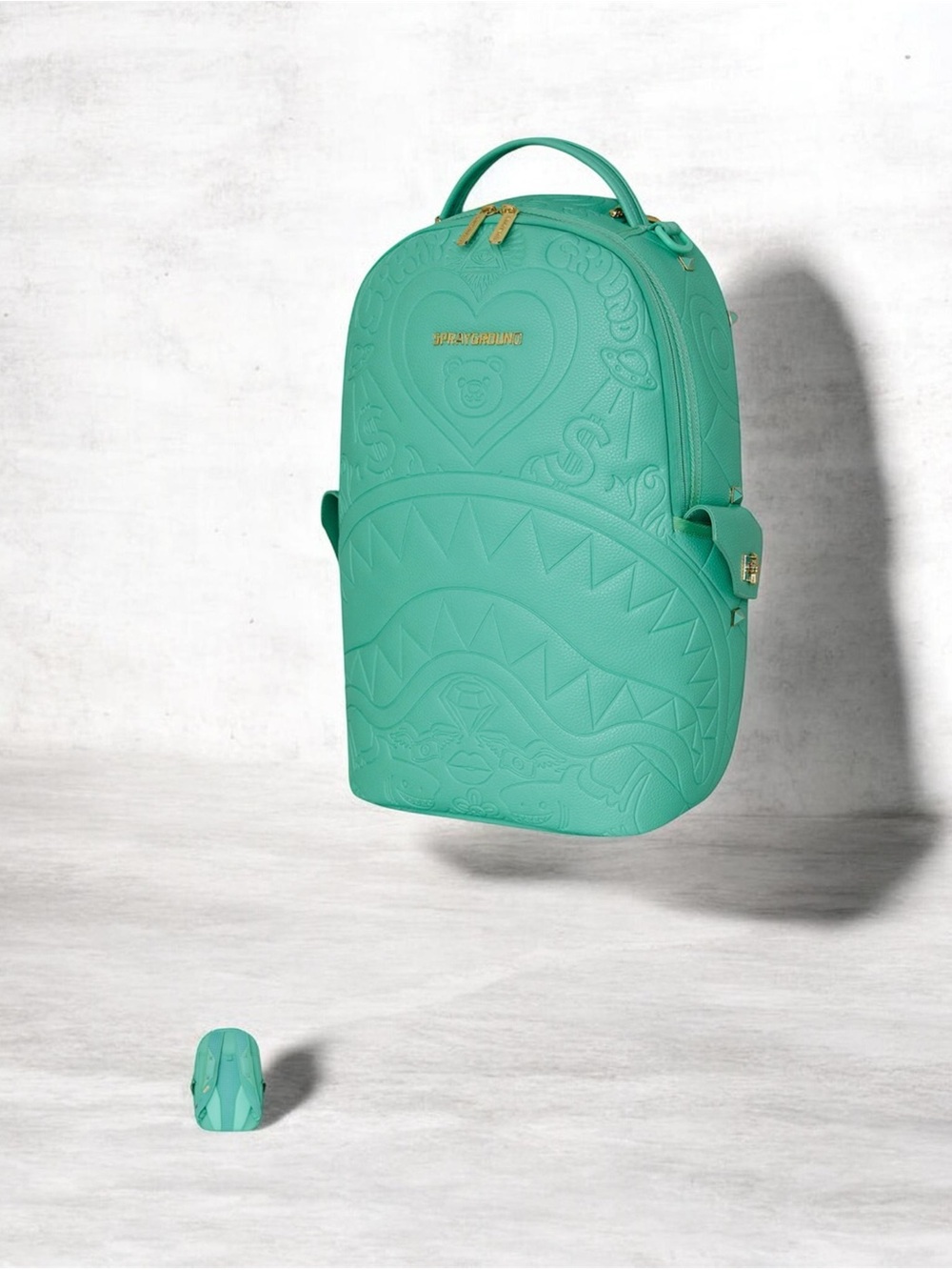 Sprayground Teal Embossed Heart & Shark Backpack